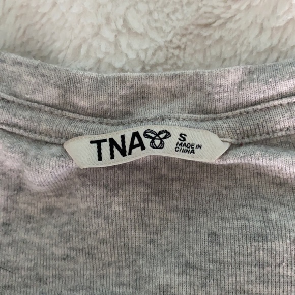 Grey TNA shirt with red logo. - Picture 3 of 3